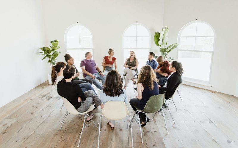 Diverse people in a supporting group session